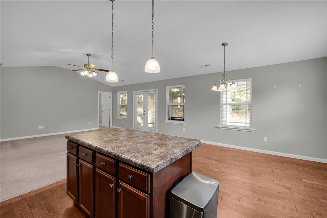 138 Madison Pointe Drive Seneca, SC 29678 - Photo 14 of 42 This bright and open space offers a seamless flow between living areas, perfect for daily living.
