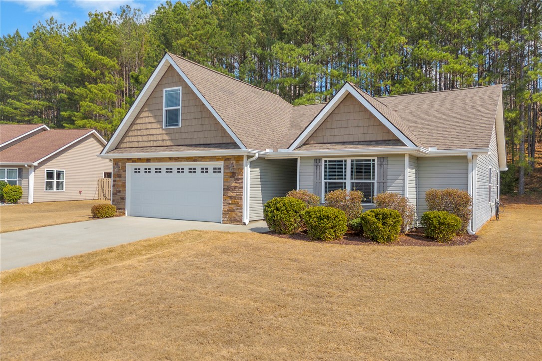 138 Madison Pointe Drive Seneca, SC 29678 - Photo 2 of 42 This charming residence features a classic design with an inviting exterior.