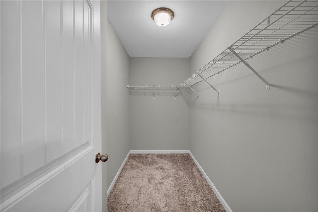 138 Madison Pointe Drive Seneca, SC 29678 - Photo 23 of 42 This ample walk-in closet features convenient wire shelving for organized storage.