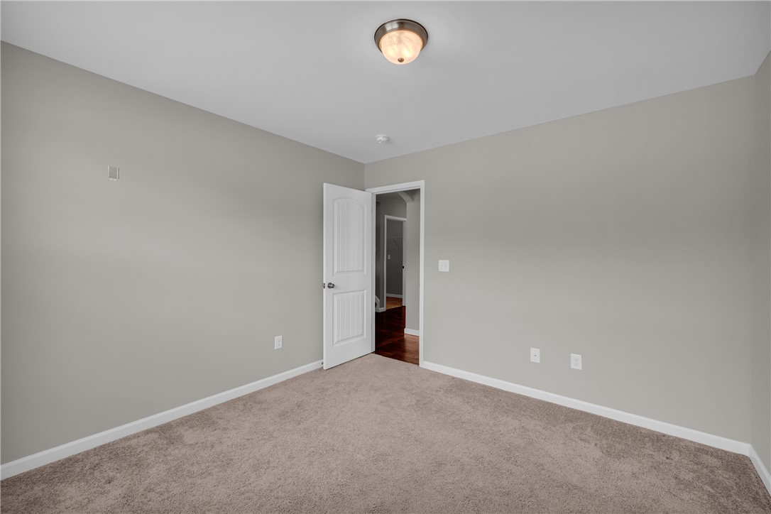 138 Madison Pointe Drive Seneca, SC 29678 - Photo 26 of 42 This spacious room offers comfort and potential, ready for personalization and relaxation.