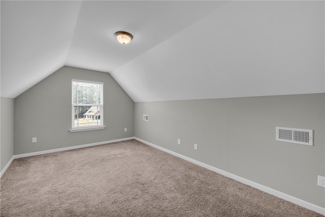 138 Madison Pointe Drive Seneca, SC 29678 - Photo 31 of 42 This spacious bonus room offers abundant natural light and versatile living space.