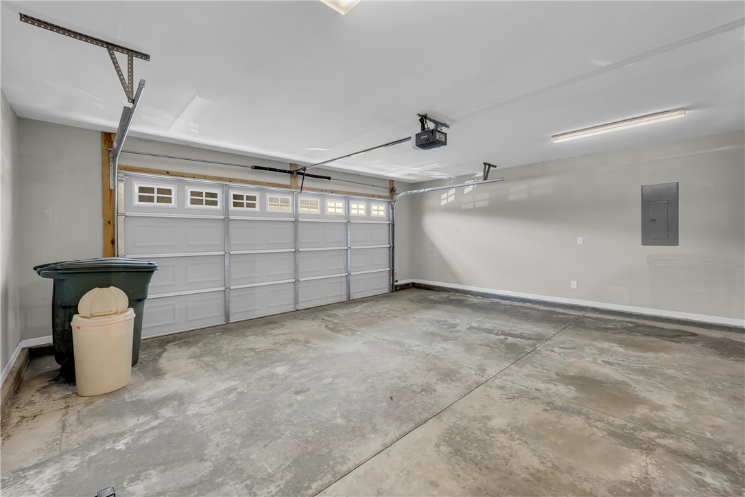 138 Madison Pointe Drive Seneca, SC 29678 - Photo 33 of 42 This spacious garage offers ample room and direct access to your home.