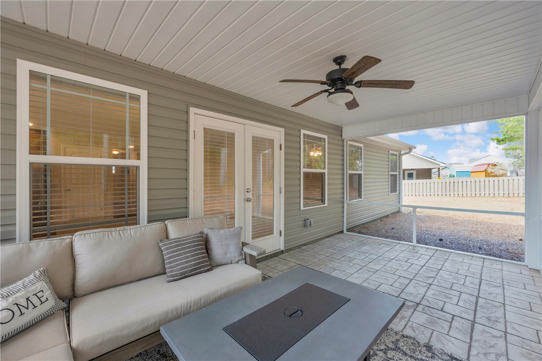138 Madison Pointe Drive Seneca, SC 29678 - Photo 36 of 42 This inviting covered patio offers a comfortable outdoor living space for relaxation and enjoyment.