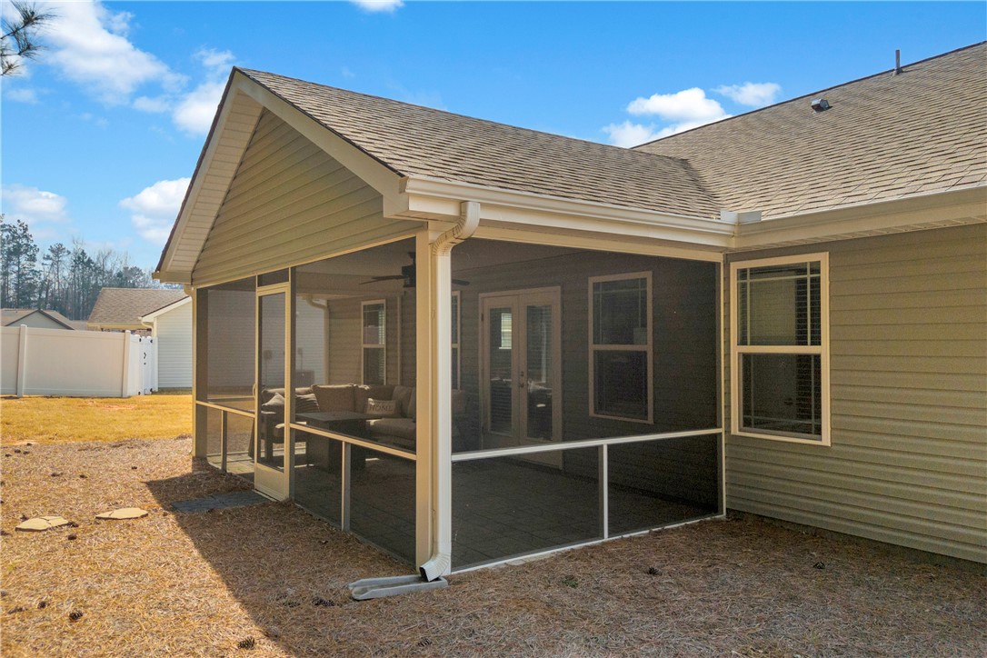 138 Madison Pointe Drive Seneca, SC 29678 - Photo 37 of 42 Enjoy outdoor living on this inviting screened porch, perfect for relaxation and entertaining.