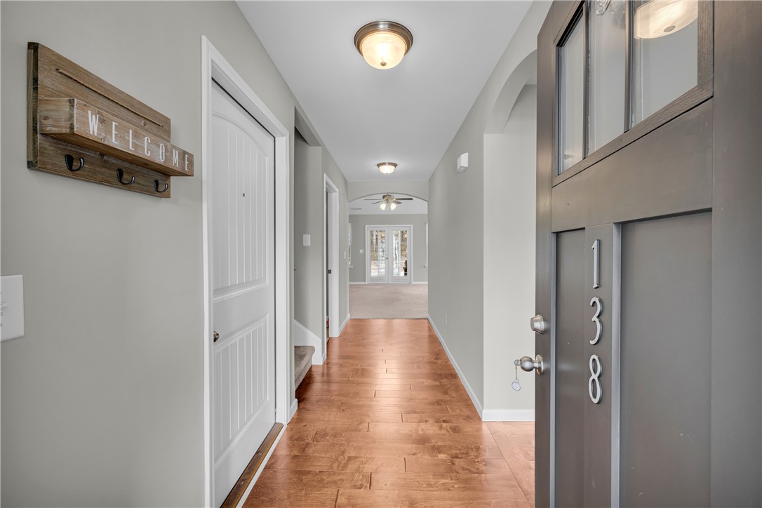 138 Madison Pointe Drive Seneca, SC 29678 - Photo 4 of 42 Step inside this inviting home featuring rich wood flooring and a bright, open hallway.