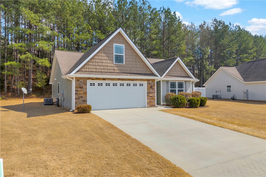 138 Madison Pointe Drive Seneca, SC 29678 - Photo 42 of 42 This charming home offers a spacious garage and inviting curb appeal.