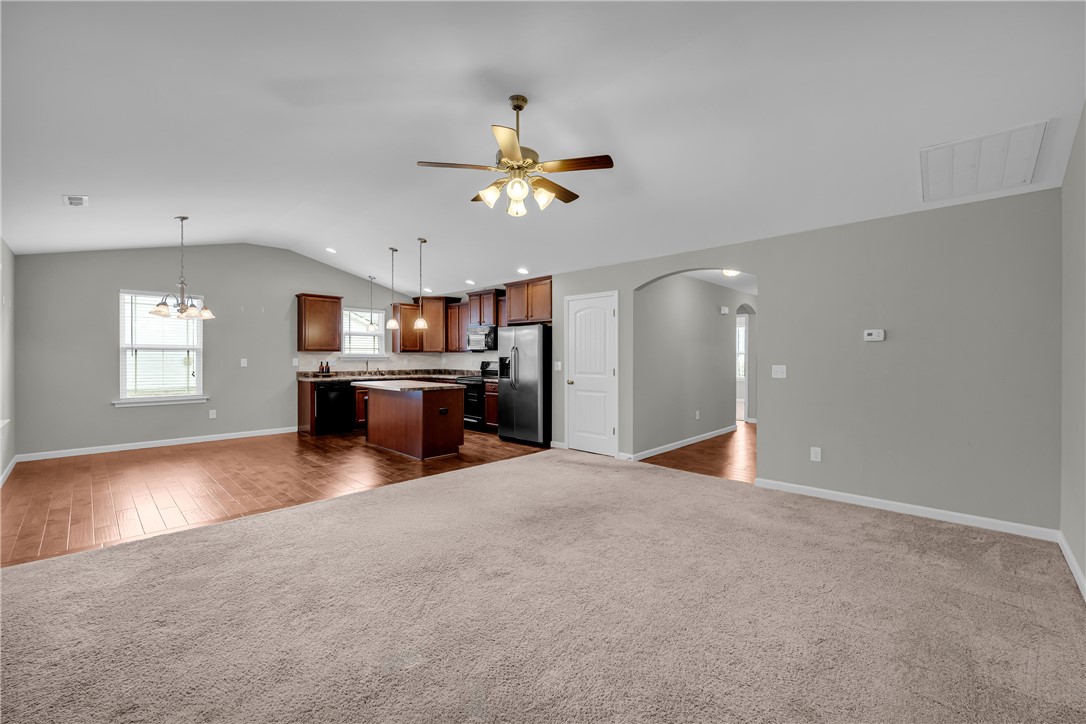 138 Madison Pointe Drive Seneca, SC 29678 - Photo 5 of 42 This inviting space seamlessly connects the kitchen and living areas, perfect for daily living.