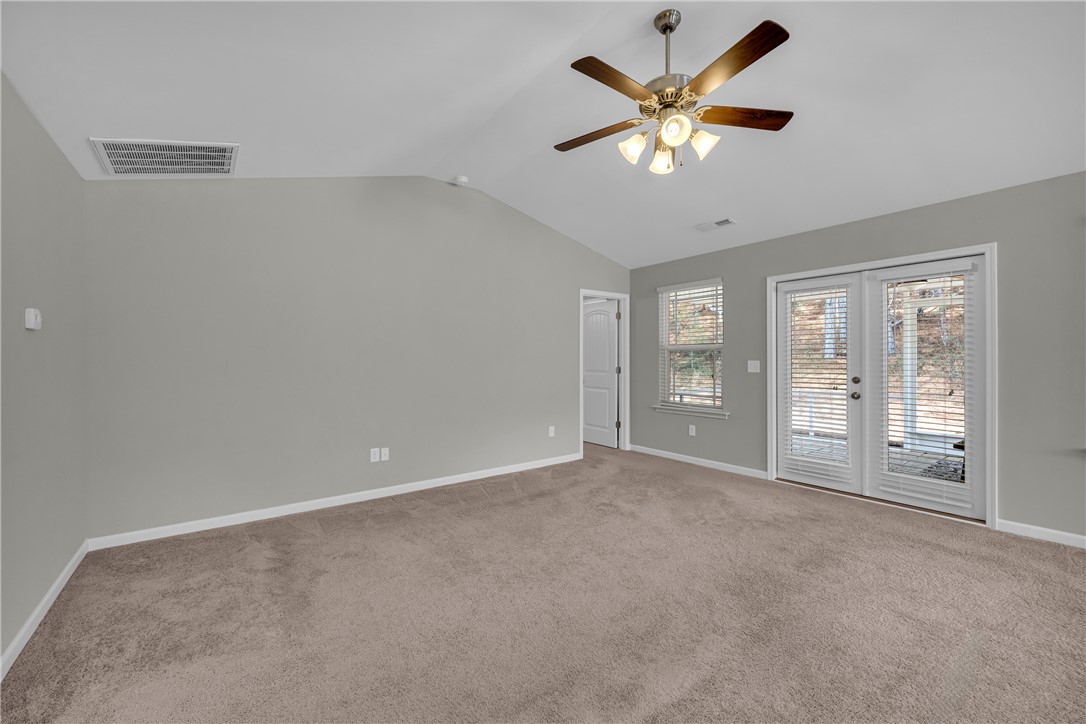 138 Madison Pointe Drive Seneca, SC 29678 - Photo 7 of 42 This spacious room features vaulted ceilings and direct outdoor access.