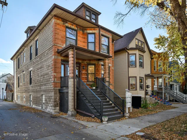 front view of a house with a small yard