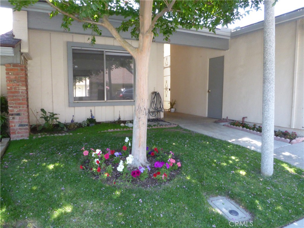 19434 Oak Crossing Road Newhall, CA 91321 - Photo 1 of 1 a view of a house with a yard and garden