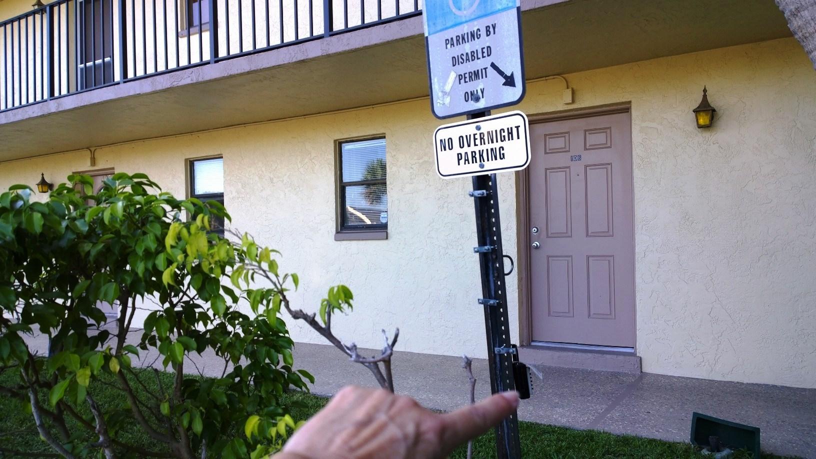 9355 Southwest 8th Street, Unit 117 Boca Raton, FL 33428 - Photo 45 of 81 Lock Box on Handicap pole on left side e