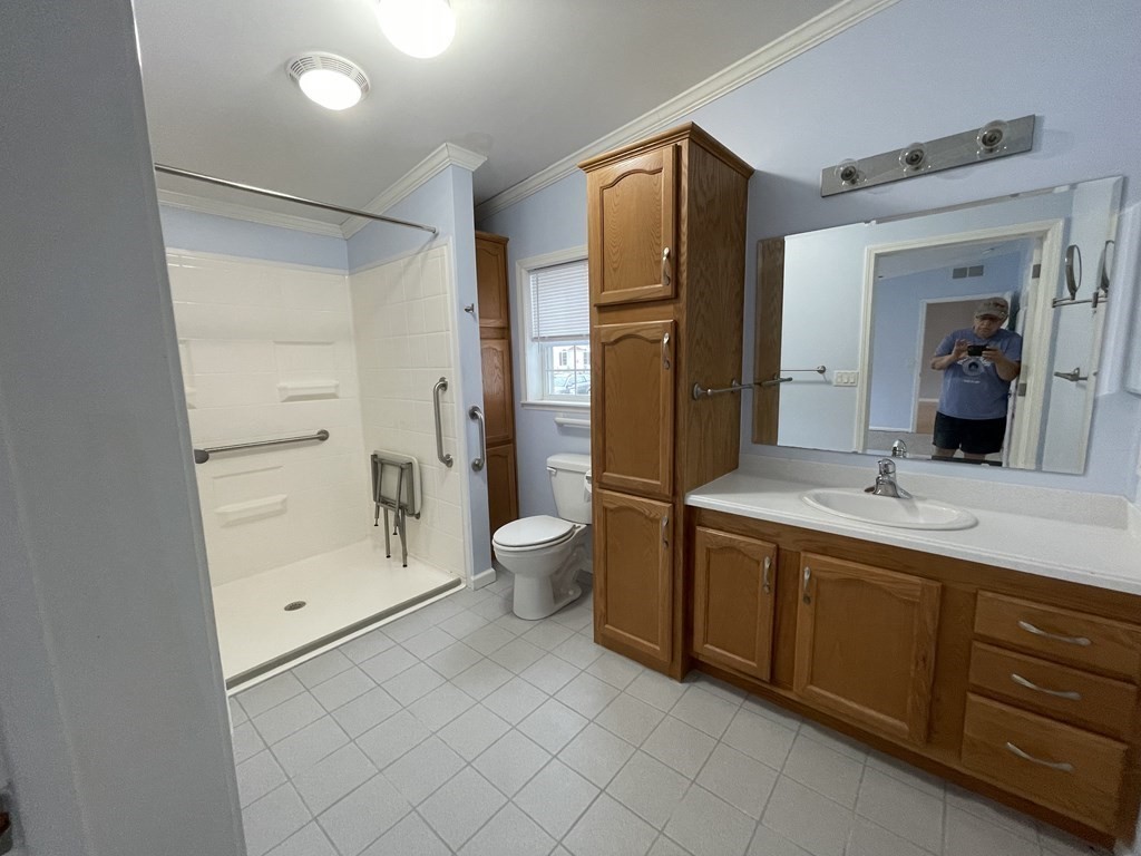 3006 Green Street Middleboro, MA 02346 - Photo 14 of 34 a spacious bathroom with a double vanity sink toilet and shower