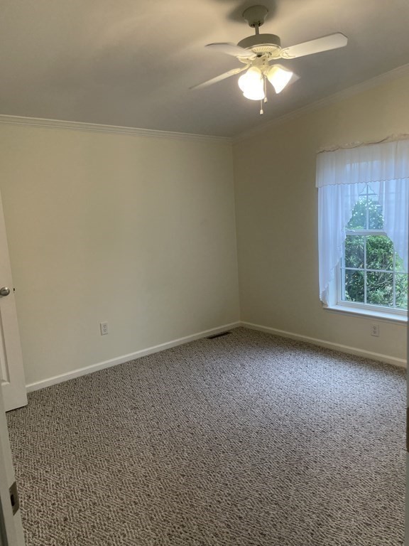 3006 Green Street Middleboro, MA 02346 - Photo 19 of 34 an empty room with a window and a ceiling fan