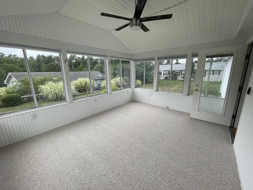 3006 Green Street Middleboro, MA 02346 - Photo 22 of 34 en empty room with large windows and outdoor view