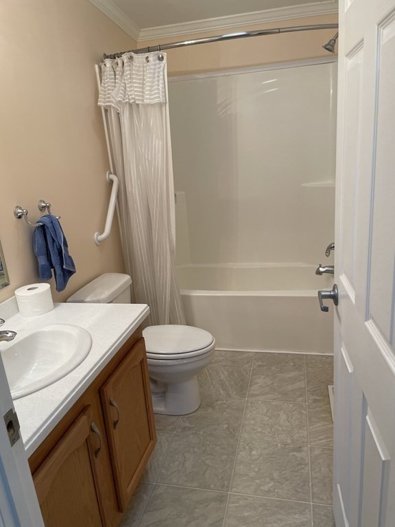 3006 Green Street Middleboro, MA 02346 - Photo 27 of 34 a bathroom with a sink a toilet and shower