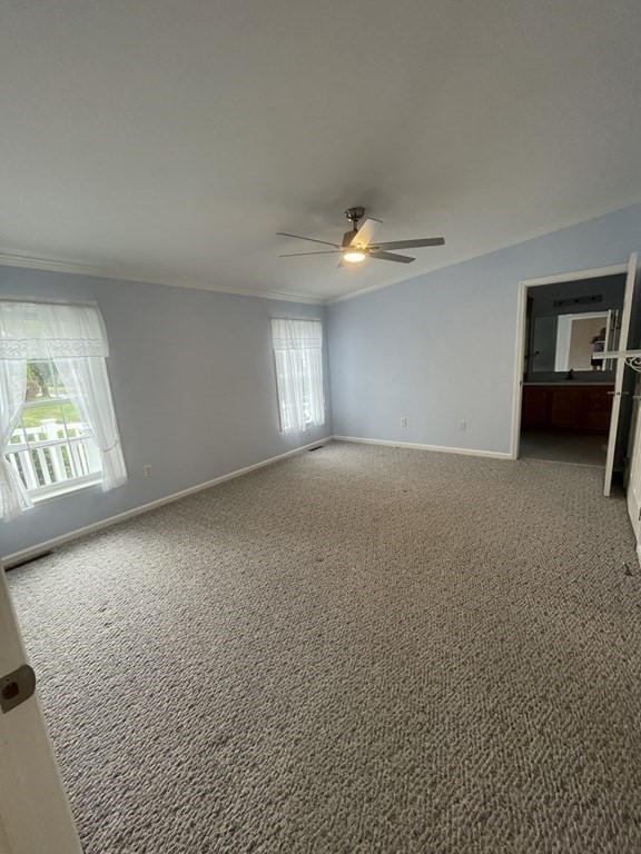 3006 Green Street Middleboro, MA 02346 - Photo 28 of 34 a view of a livingroom with a ceiling fan and window