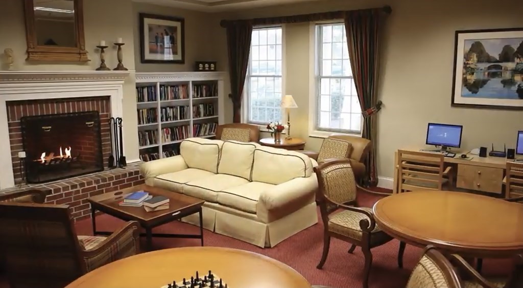3006 Green Street Middleboro, MA 02346 - Photo 30 of 34 a living room with furniture a fireplace and a large window