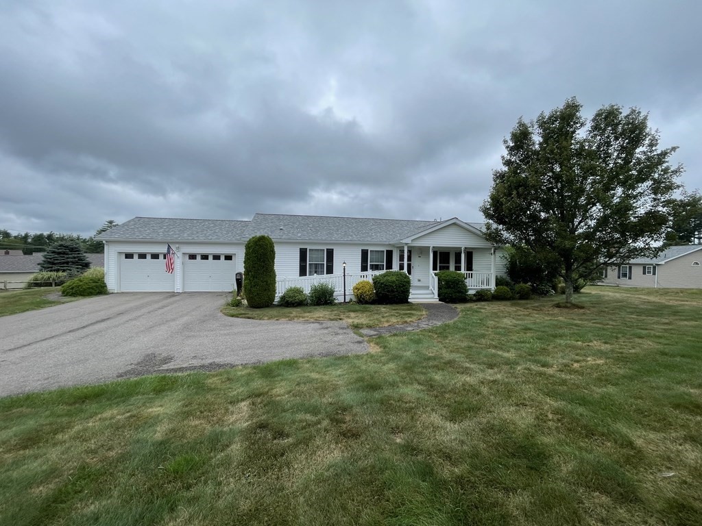 3006 Green Street Middleboro, MA 02346 - Photo 3 of 34 a front view of a house with a yard