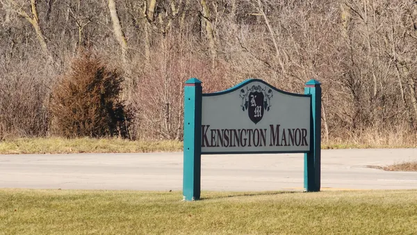 a sign on the side of the road