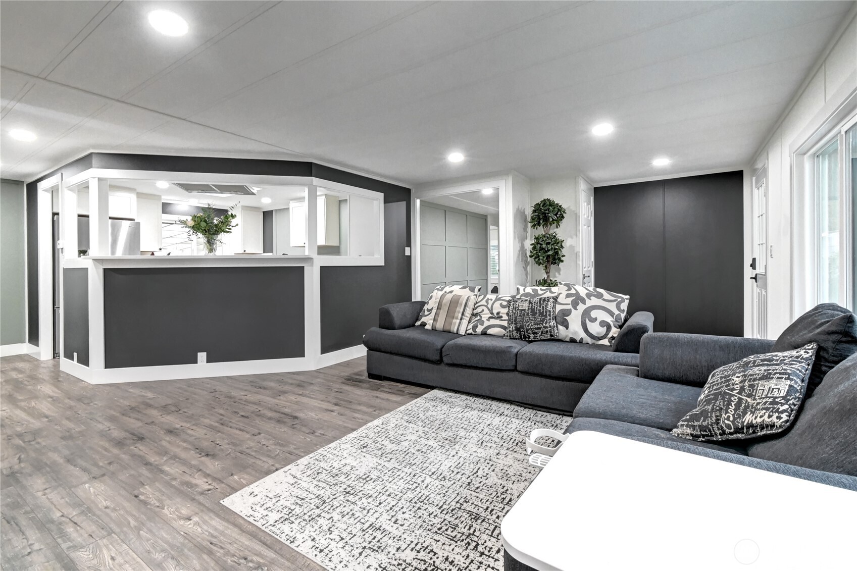 1615 208th Street Southeast, Unit 42 Bothell, WA 98012 - Photo 11 of 32 a living room with furniture and a fireplace