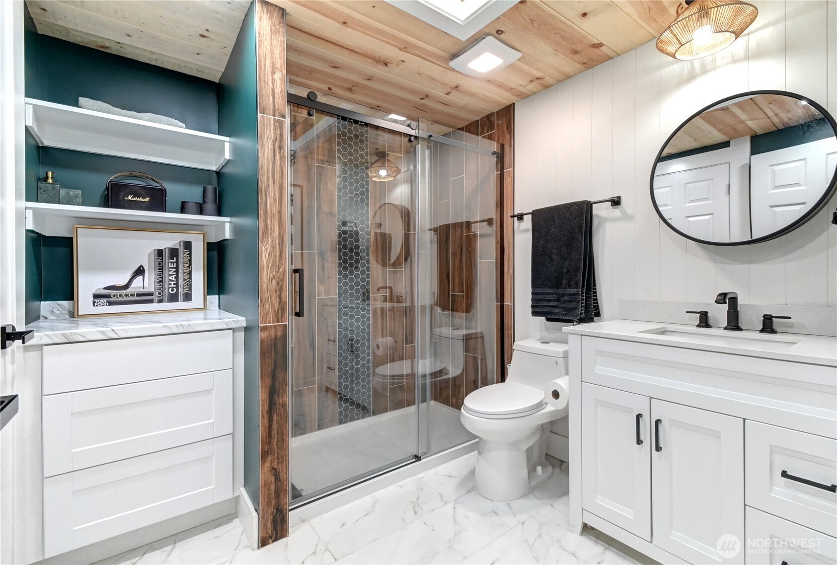 1615 208th Street Southeast, Unit 42 Bothell, WA 98012 - Photo 14 of 32 a bathroom with a toilet sink and mirror