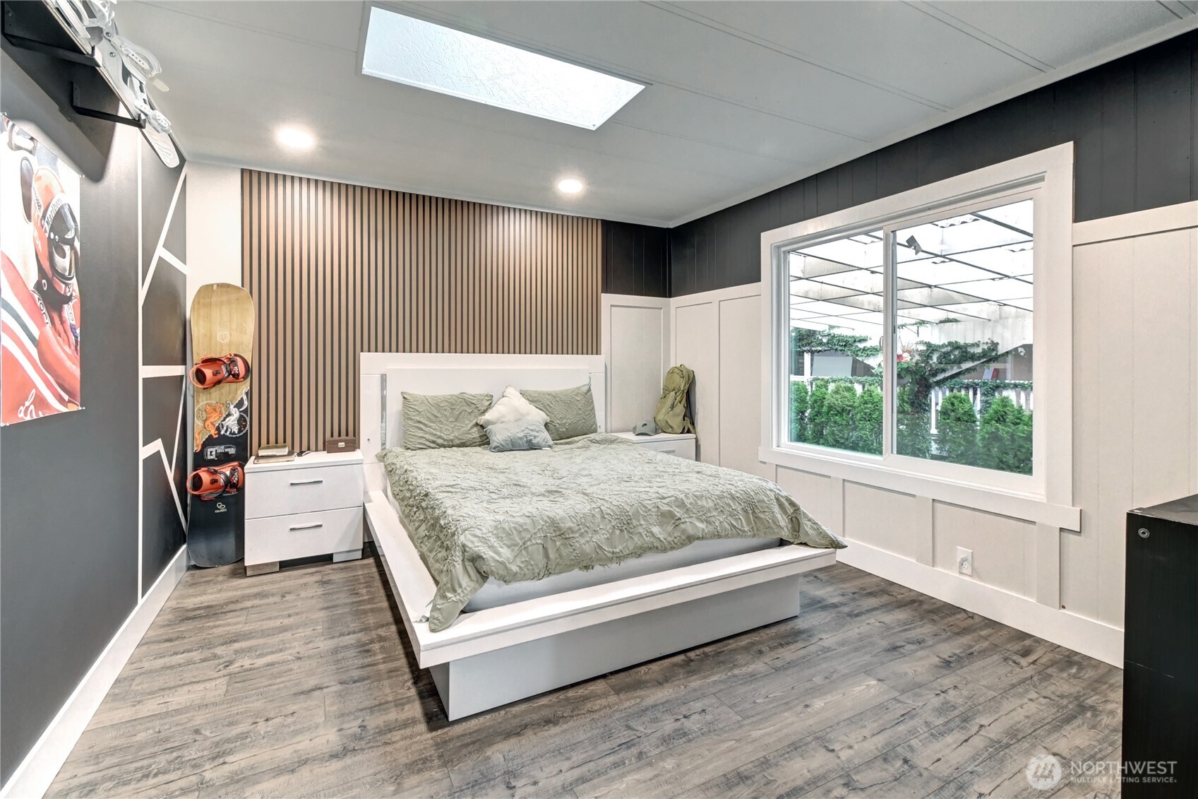 1615 208th Street Southeast, Unit 42 Bothell, WA 98012 - Photo 22 of 32 a spacious bedroom with a large bed and a large window