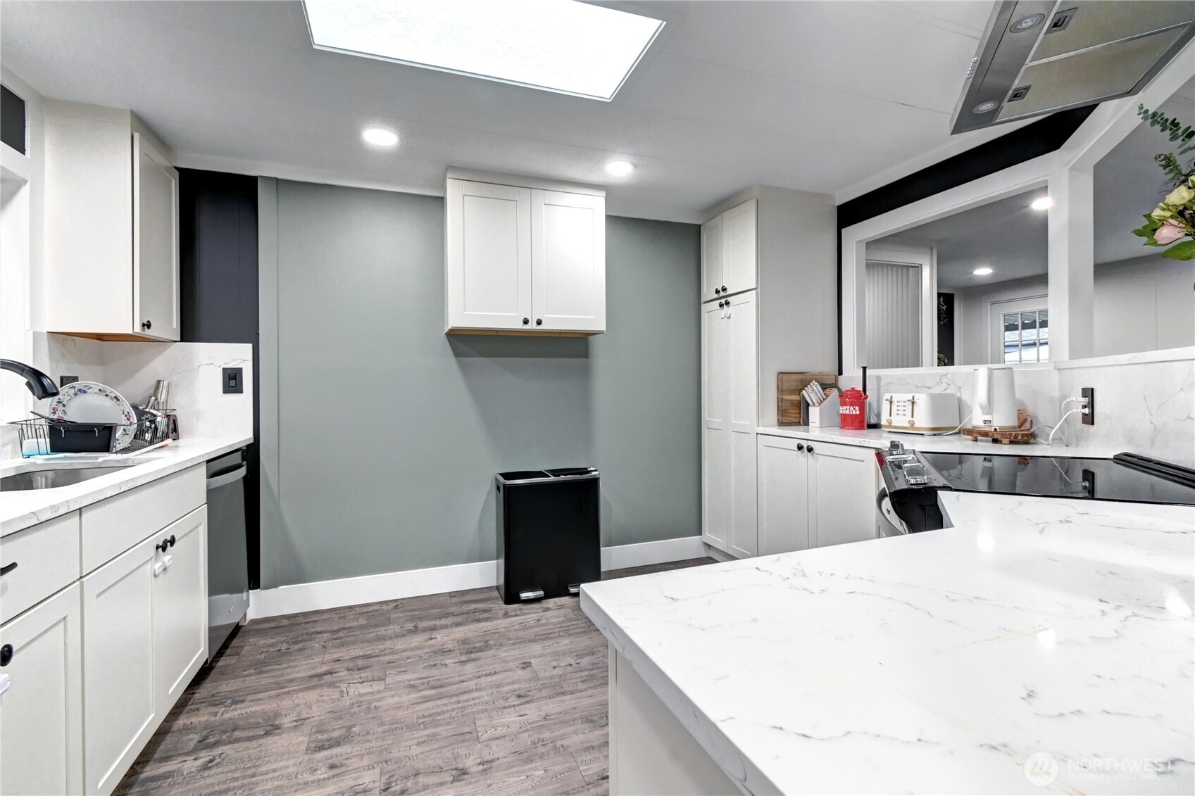 1615 208th Street Southeast, Unit 42 Bothell, WA 98012 - Photo 23 of 32 a kitchen with kitchen island sink and refrigerator
