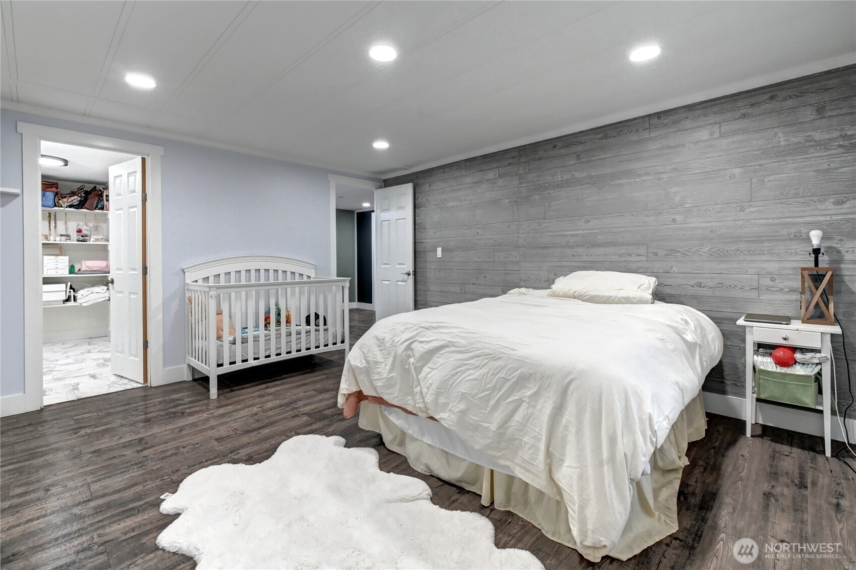 1615 208th Street Southeast, Unit 42 Bothell, WA 98012 - Photo 25 of 32 a bedroom with a bed and a window