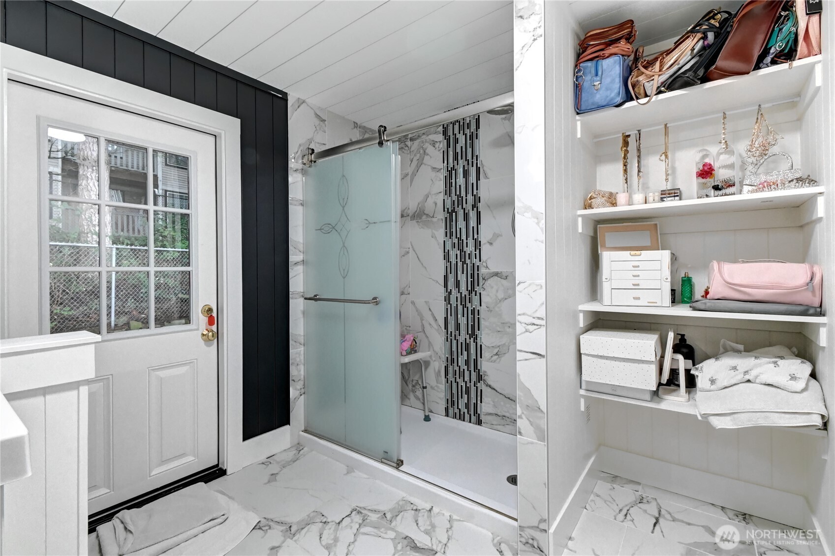 1615 208th Street Southeast, Unit 42 Bothell, WA 98012 - Photo 27 of 32 a bathroom with a bathtub and a shower