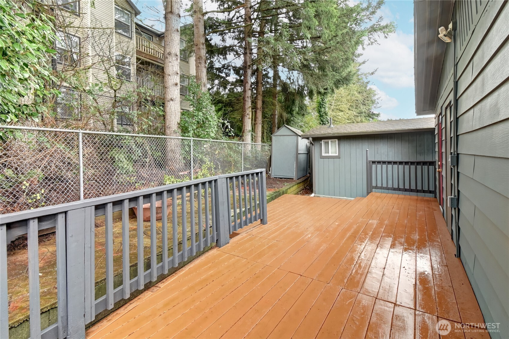 1615 208th Street Southeast, Unit 42 Bothell, WA 98012 - Photo 32 of 32 a balcony with trees in front of it