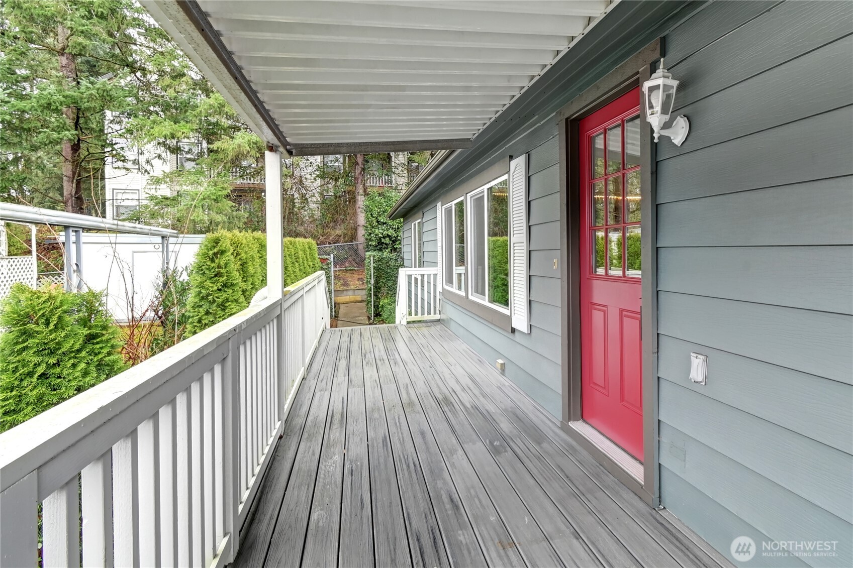 1615 208th Street Southeast, Unit 42 Bothell, WA 98012 - Photo 4 of 32 a view of balcony with wooden floor