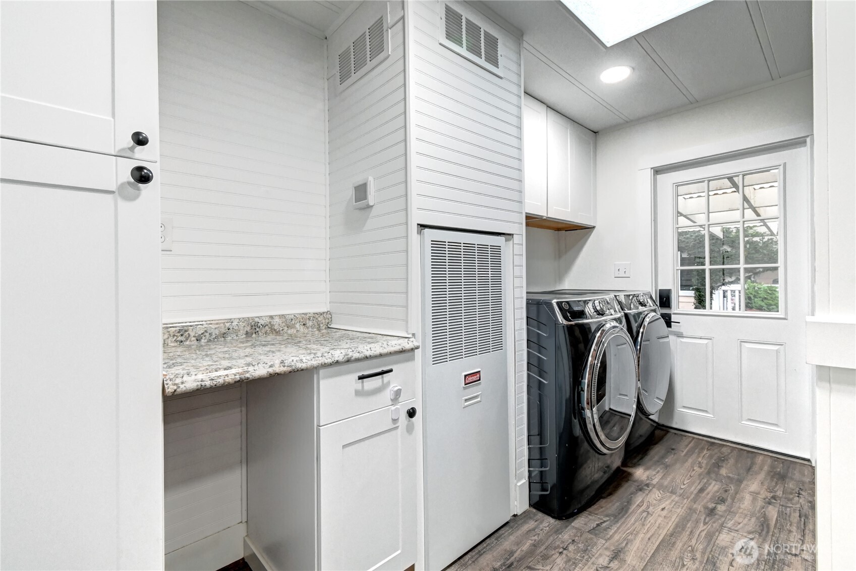 1615 208th Street Southeast, Unit 42 Bothell, WA 98012 - Photo 5 of 32 a utility room with dryer and washer