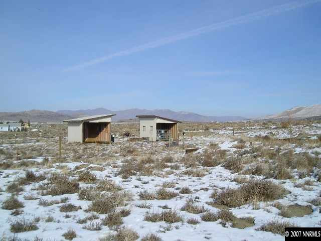 1374 Antelope Valley Road Reno, NV 89506 - Photo 8 of 9 a view of a dry yard with a building in the background