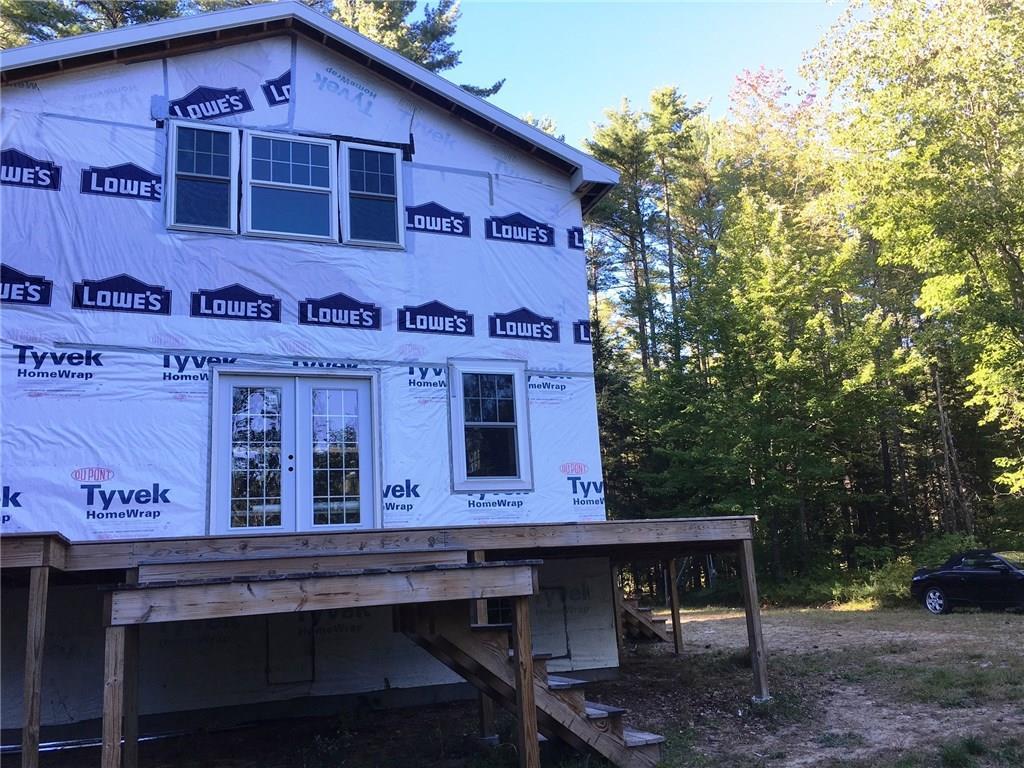 24 Pinecliffe Road Harrison, ME 04040 - Photo 31 of 32 Side view of the property. Slider...