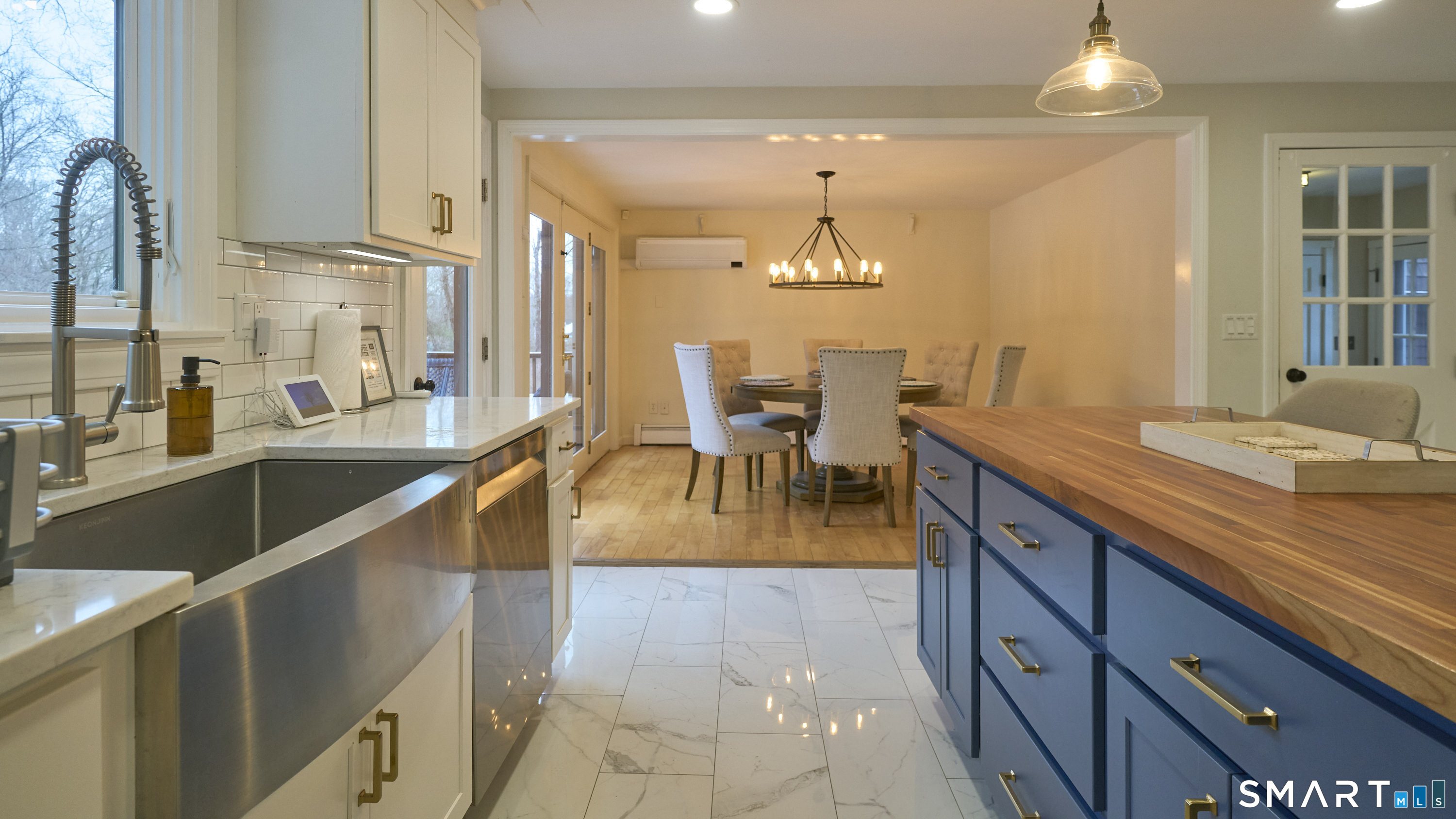Kitchen-to-dining sightline - Open flow and natural light continuity - fosters connected living spaces.