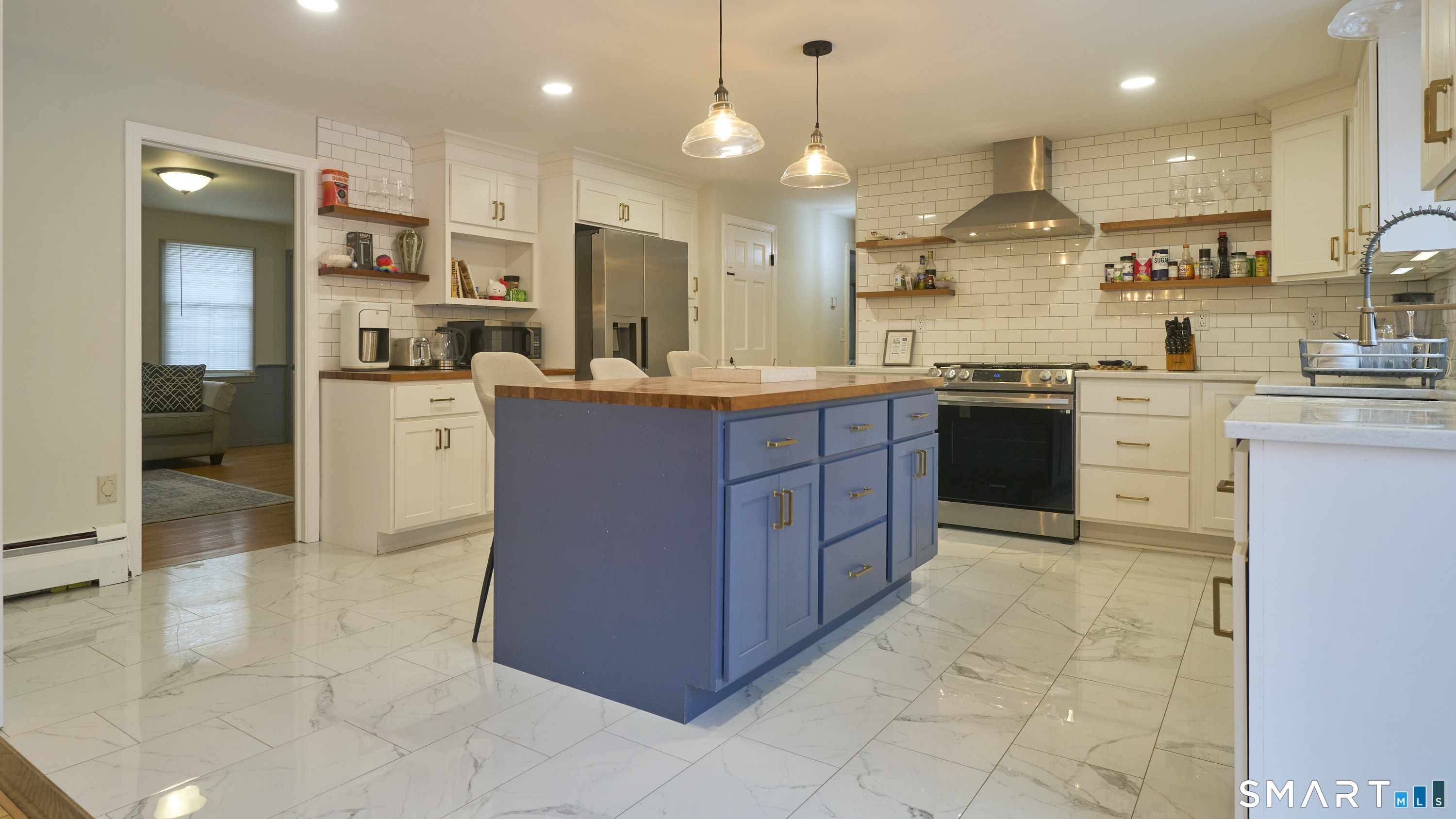 15 Haywardville Road East Haddam, CT 06423 - Photo 11 of 40 Center island focal point - Butcher block warmth and seating capacity - creates a natural gathering hub.