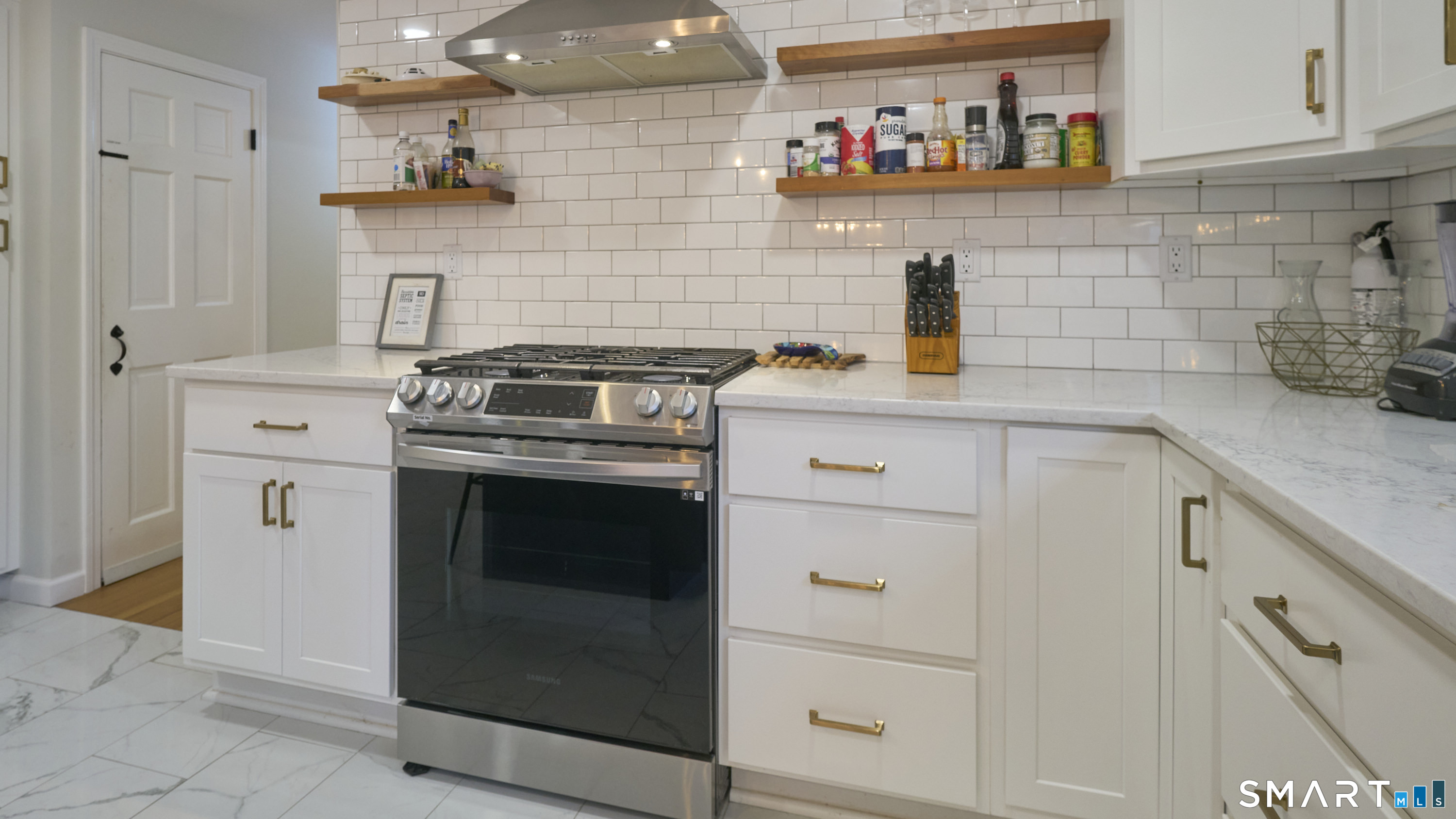 15 Haywardville Road East Haddam, CT 06423 - Photo 14 of 40 European-designed hood and shelving - Architectural ventilation solution with display storage - blends performance with design presence