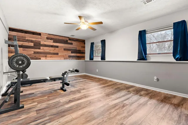 a view of a room with gym equipment