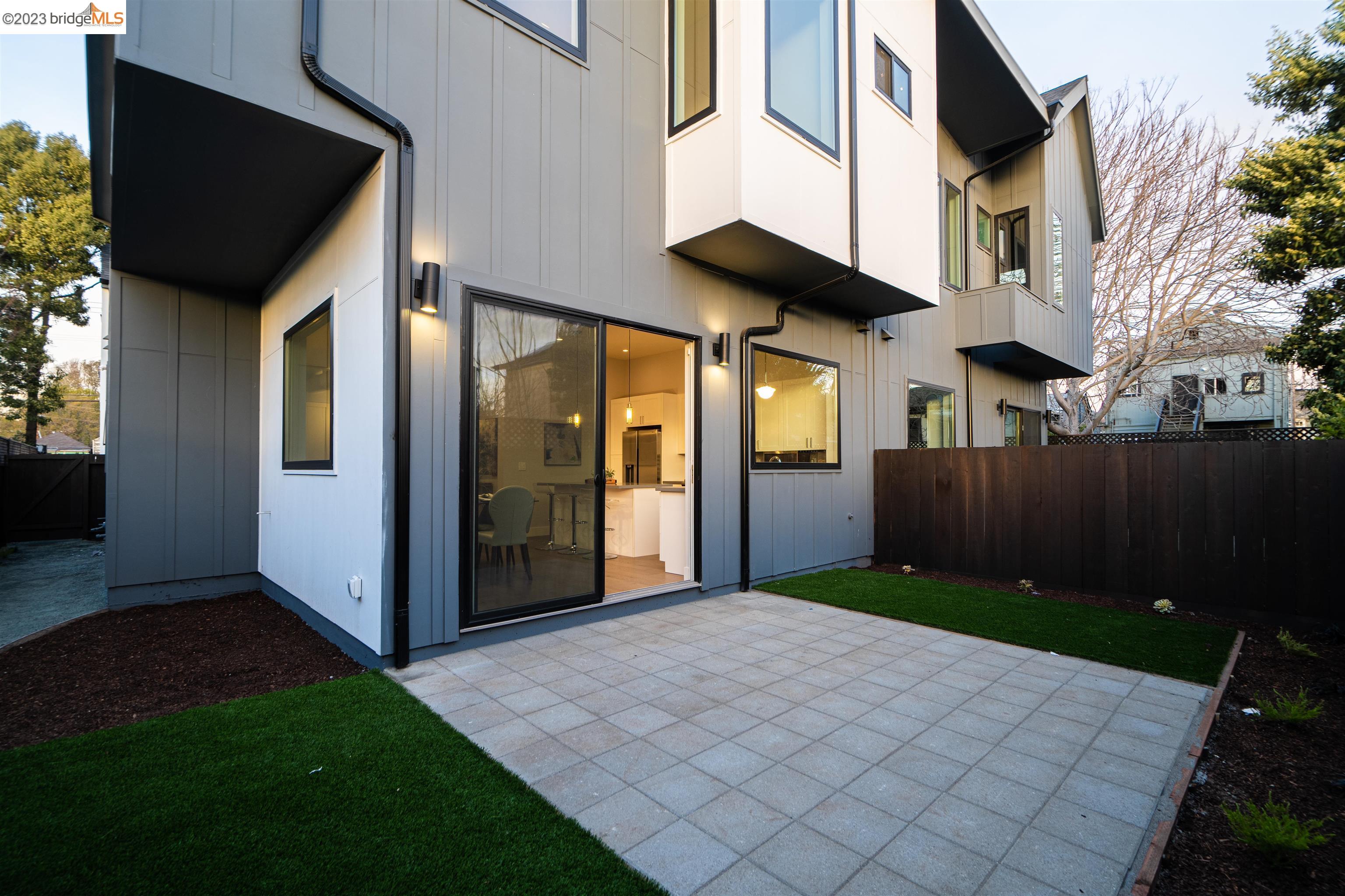 1679 12th Street Oakland, CA 94607 - Photo 25 of 26 a view of a brick house with a large windows