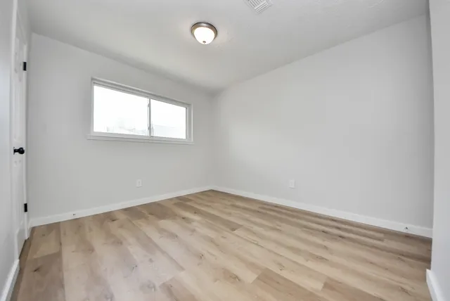 an empty room with a window