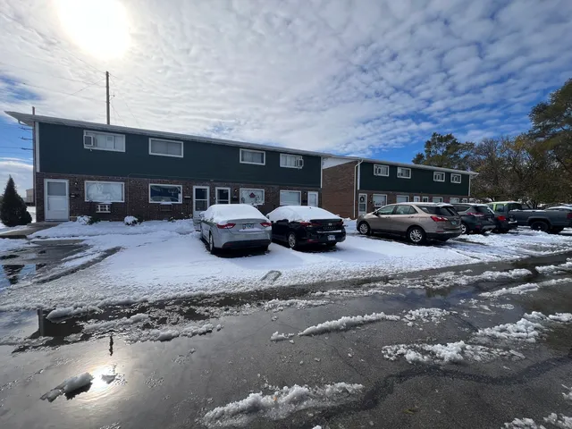 a car parked in front of a house