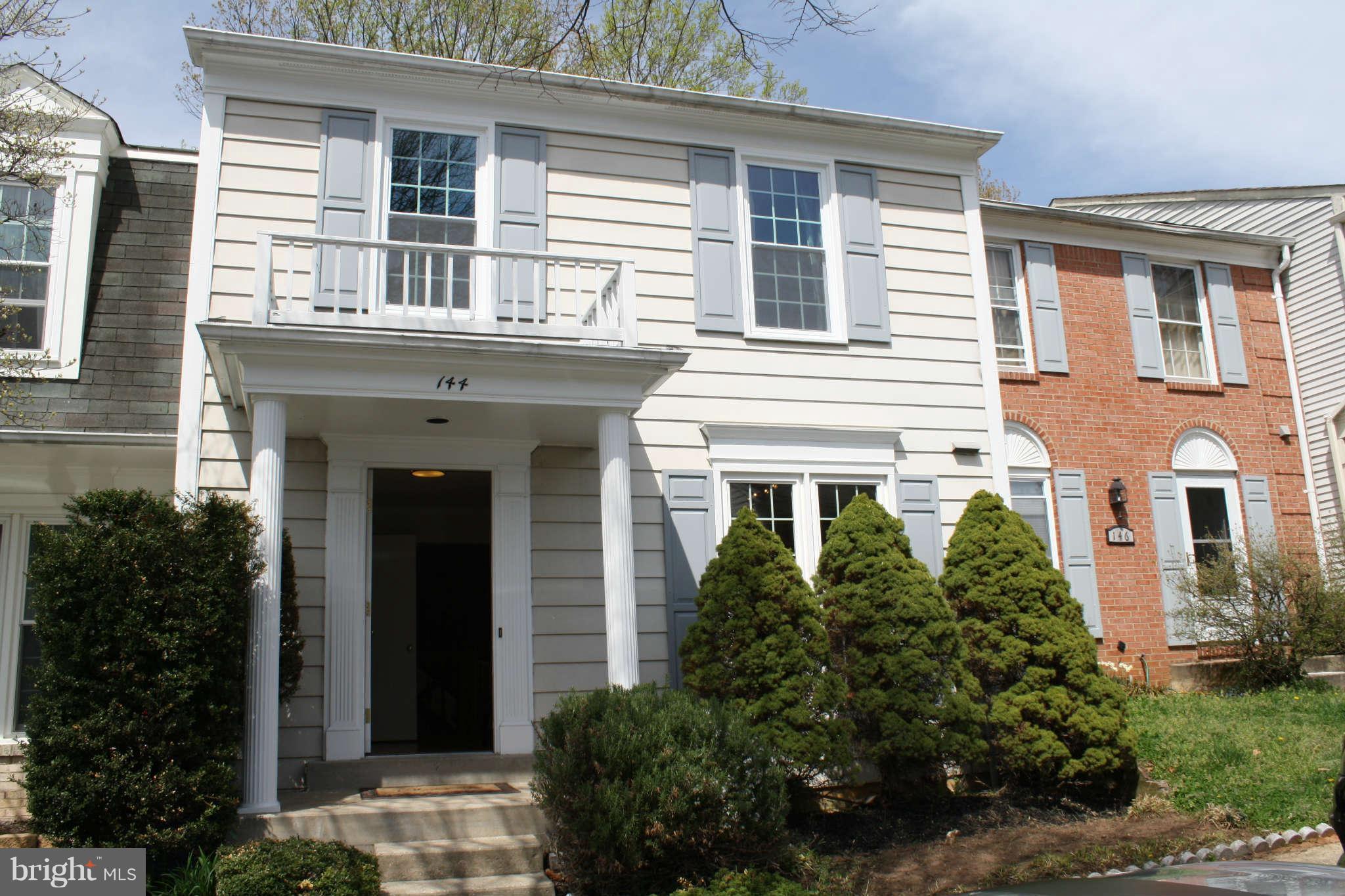 144 Finale Terrace Silver Spring, MD 20901 - Photo 20 of 21 a front view of a house with a yard