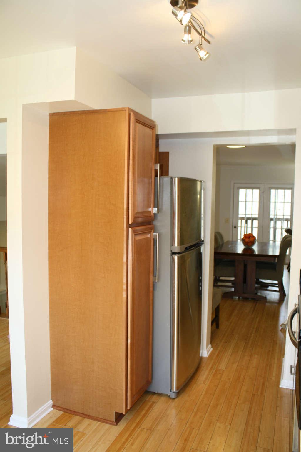 144 Finale Terrace Silver Spring, MD 20901 - Photo 4 of 21 a view of a living room with a refrigerator