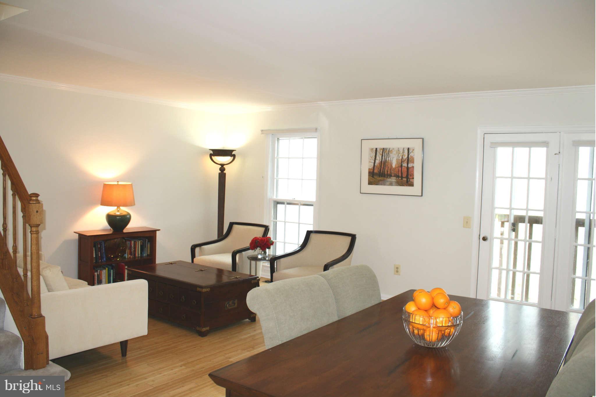 144 Finale Terrace Silver Spring, MD 20901 - Photo 6 of 21 a living room with furniture and wooden floor
