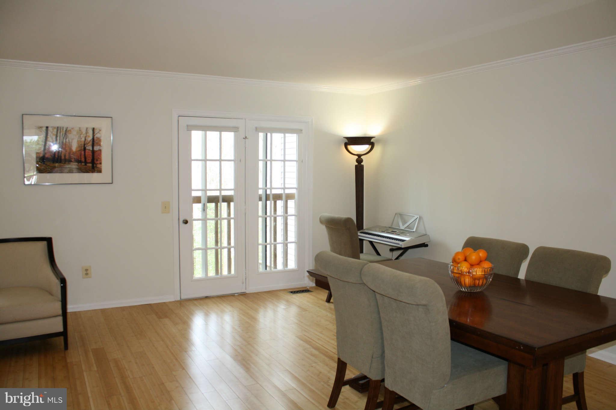 144 Finale Terrace Silver Spring, MD 20901 - Photo 7 of 21 a living room with furniture and a window