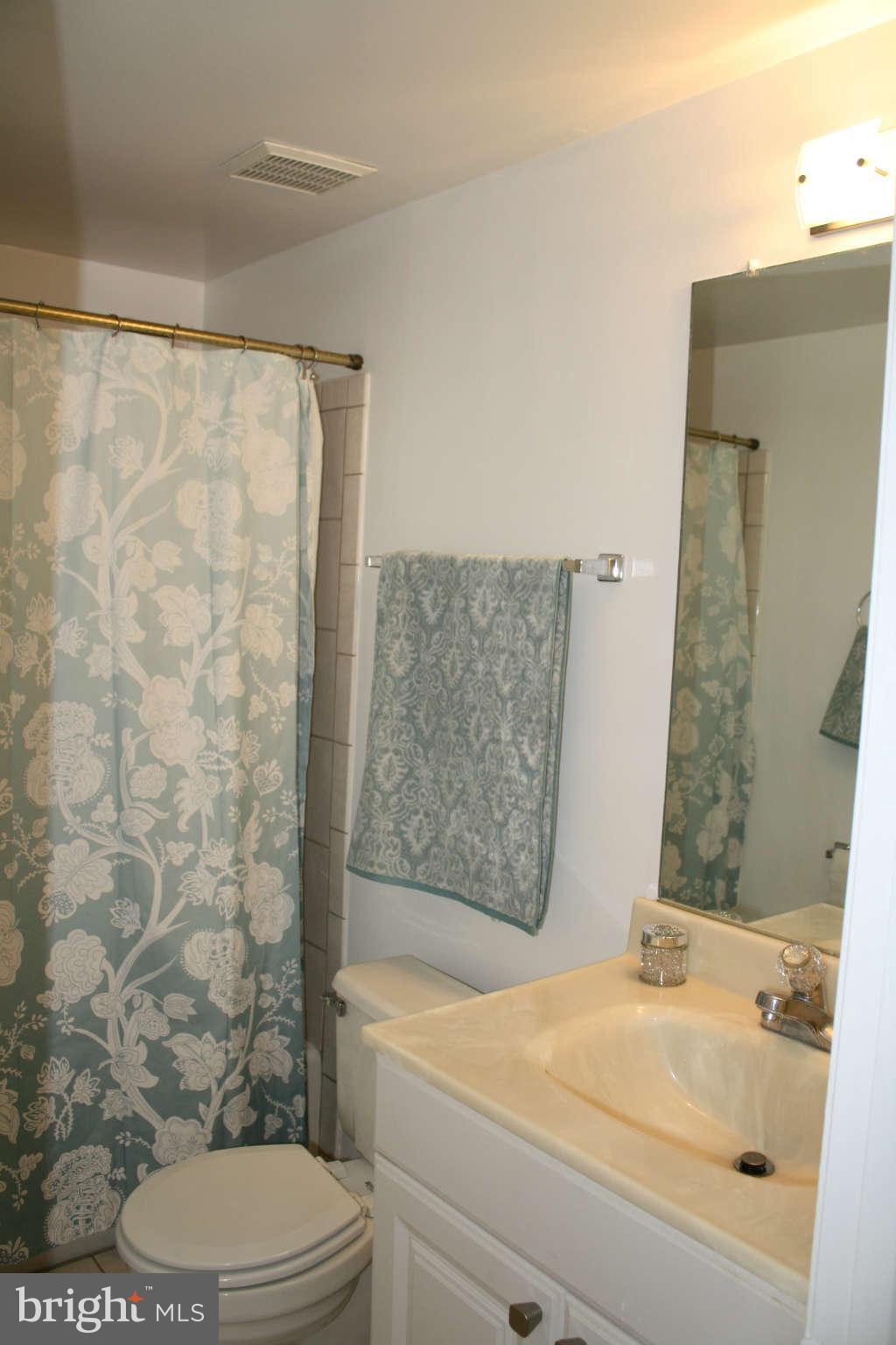 144 Finale Terrace Silver Spring, MD 20901 - Photo 8 of 21 a bathroom with a sink toilet and shower