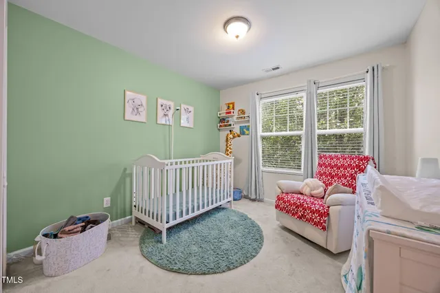 a living room with a couch and a table