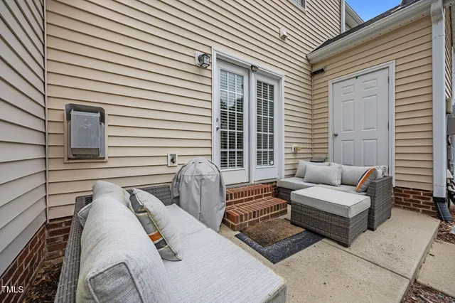 a view of a patio with couches and a patio