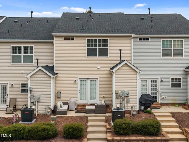 a front view of a house with a patio