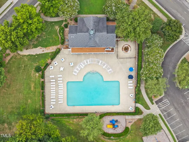 an aerial view of a house with garden